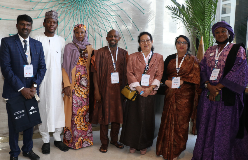 seven symposium attendees standing together